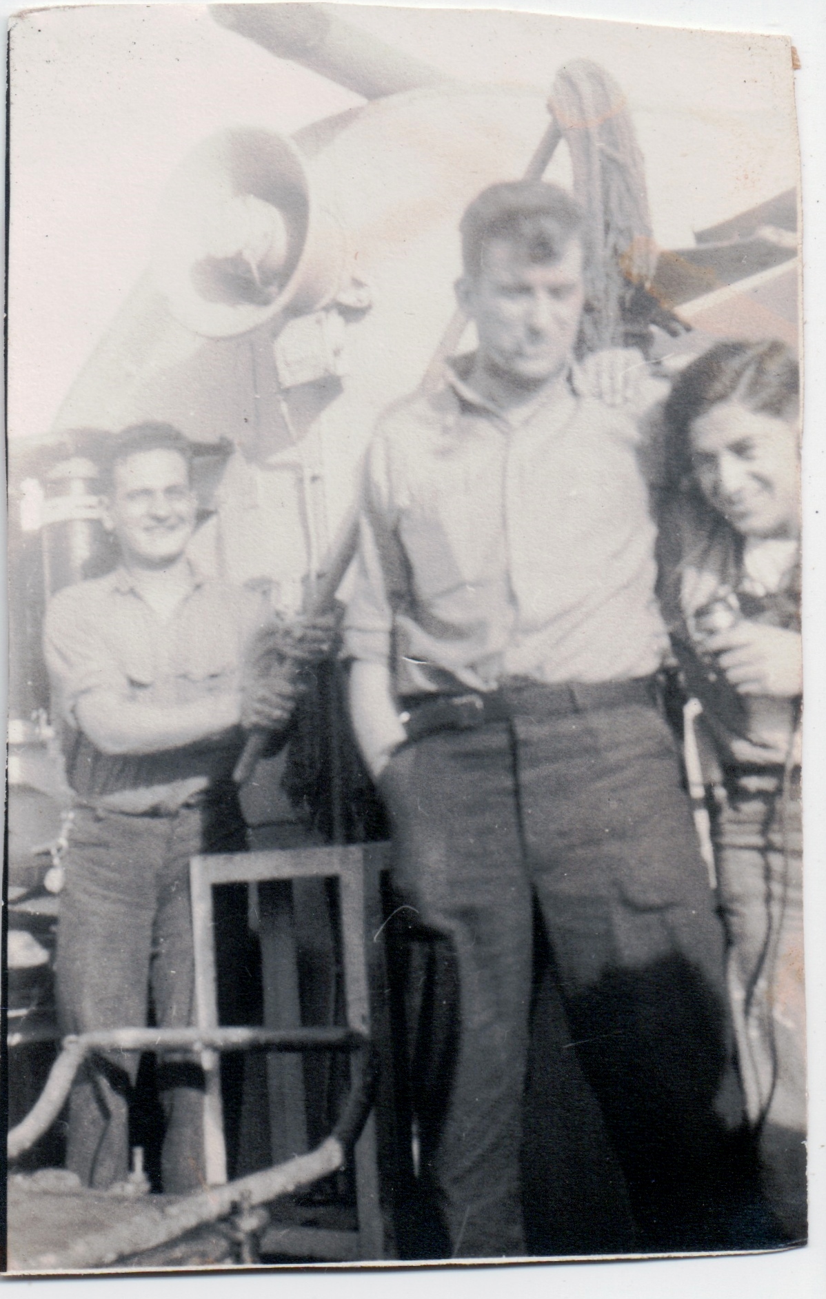 Joseph Lombardi on right with two other motor mechanics.